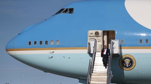 President Donald Trump exits Air Force One