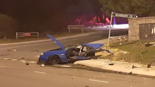 The couple's Skyline was torn in half following the crash.