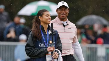 Tiger Woods of the United States looks on with daughter Sam Woods on the 18th green during the first round of the PNC Championship at The Ritz-Carlton Golf Club on December 16, 2023 in Orlando, Florida. (Photo by Mike Mulholland/Getty Images)