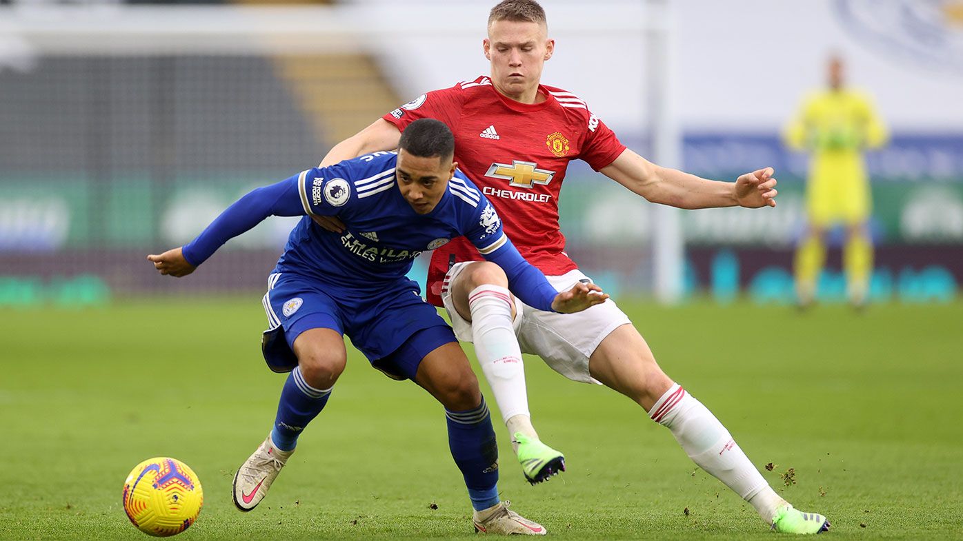 Youri Tielemans of Leicester City is challenged by Scott McTominay of Manchester United.