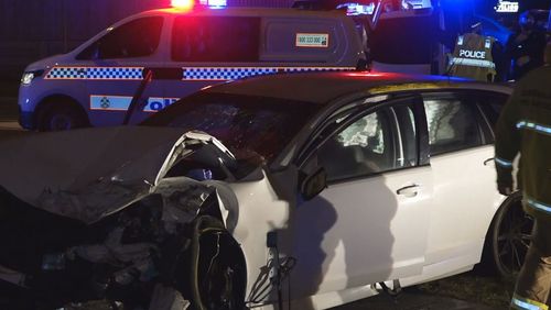 A man is fighting for life and two others hospitalised after a high-speed crash in Pimpama