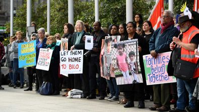 Supporters of the Biloela Tamil asylum seeker family gather outside of the Federal Court in Melbourne.