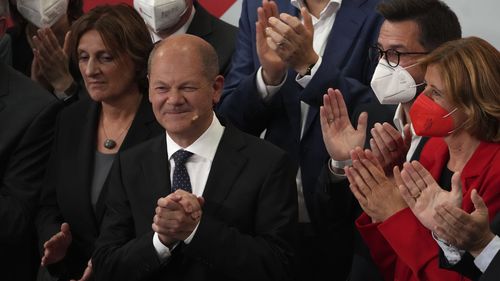 Olaf Scholz addressed his supporters after German parliament election at the Social Democratic Party, SPD, headquarters in Berlin on Sunday. 