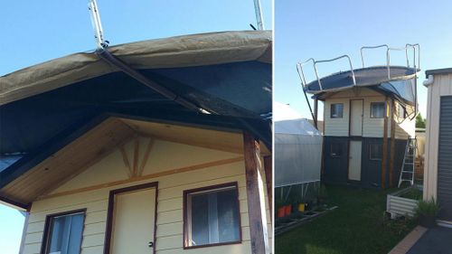 A family found their neighbour's trampoline had been blown onto the roof of their cubby house. (Image courtesy of Jasmin LeMarrec)