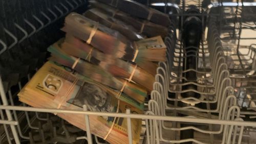 Police have seized $250,000 in cash found in a Blacktown dishwasher.