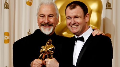 Dave Elsey (right) with Rick Baker, after snapping the top gong for their hair and makeup styling in horror movie The Wolfman. (AAP)