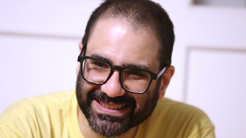 Pro-democracy activist Alaa Abd el-Fattah, who was in prison for almost all of the past 12 years, speaks to his friends at his home after he got a presidential pardon, in Cairo, Tuesday, Sept. 23, 2025. (AP Photo/Khaled Elfiqi, File)