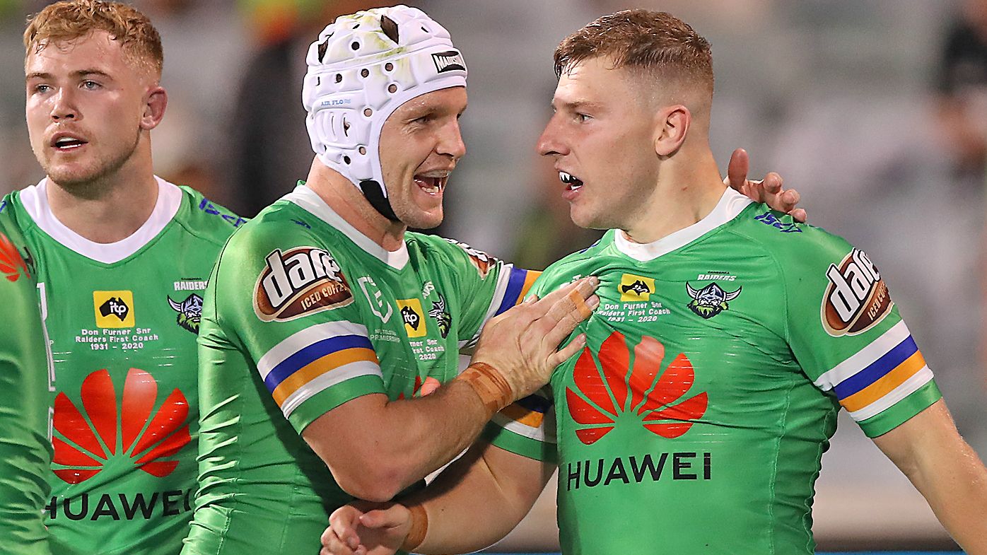 George Williams of the Raiders celebrates with Jarrod Croker 