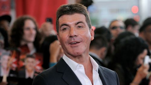 Simon Cowell, executive producer and a judge on "The X Factor", poses at a world premiere screening event for the new television series, in Los Angeles, USA in 2011. (AP)