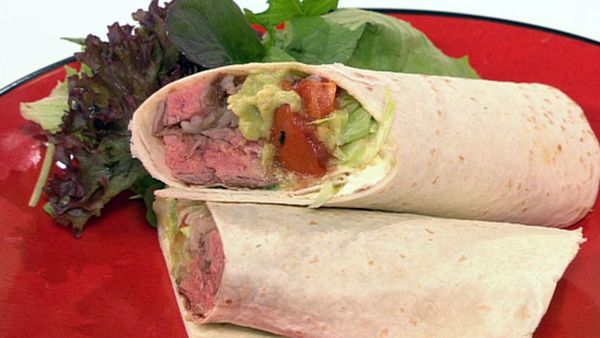 Spicy steak burritos with spanish rice and char-grilled tomato