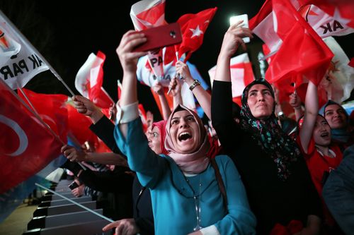Erdogan claims victory in Turkish dual elections