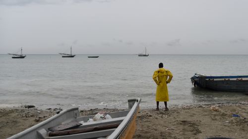 A fisherman looks at the sea in Caira beach, in the Haitian commune of Leogane, on October 3. (AFP)