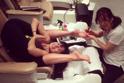 When we kick back for a mani/pedi, it looks a little different than this.<br/><br/>Perhaps Hilaria's she's head over heels for her beautician...? (We had to do it!)<br/>