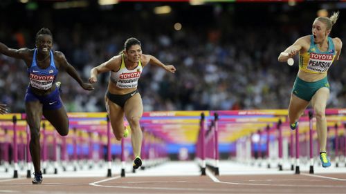 Pearson crosses the line to win the 100m hurdles at the 2017 World Championships in London. (AAP)