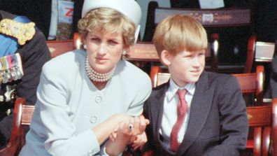 Diana Princess of Wales holding the hand of her son Prince Harry at a ceremony in Hyde Park, London, marking the 50th anniversary of VE Day at the end of World War Two