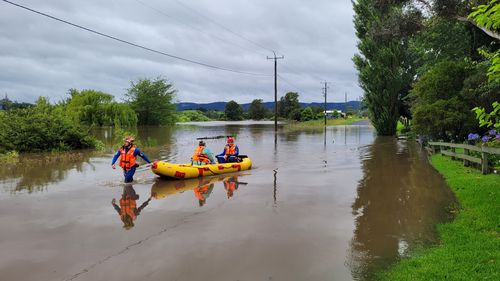 NSW SES had to rescue the woman from floodwaters in Bega.