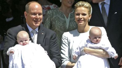 Prince Albert II of Monaco, left, and his wife Princess Charlene pose with their twins babies Princess Gabriella, left, and Prince Jacques, right. (AAP)