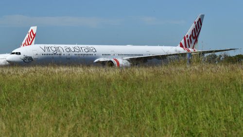 Grounded Qantas and Virgin Australia aircraft are seen parked at Avalon Airport in Melbourne, in April. Government-mandated travel restrictions have grounded a significant proportion of Australia's airline fleet because of the Coronavirus