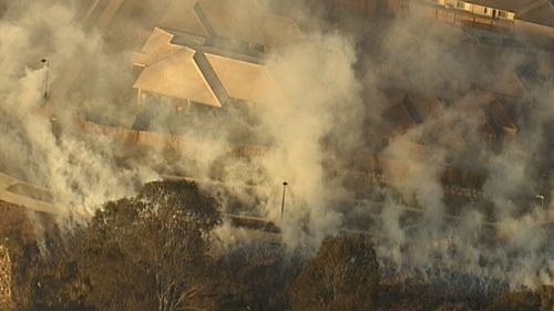 The fires are leaving a trail of singed earth and heavy smoke across the state.