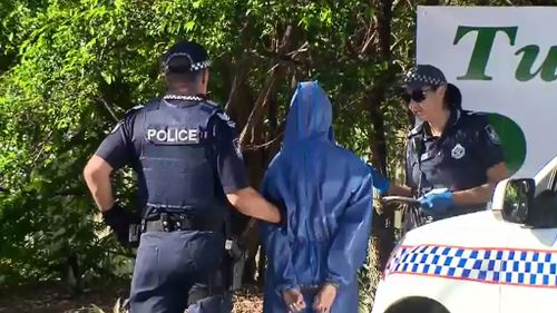 A woman was arrested at the scene and charged with attempted murder. (9NEWS)
