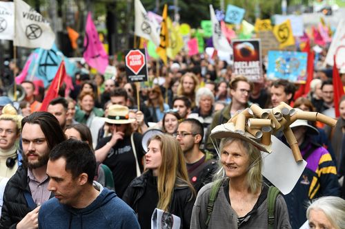Activists participate in an Extinction Rebellion protest in Melbourne, Monday, October 7, 2019.