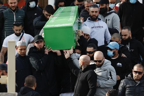 The coffin containing the body of the slain underworld is carried down the front stairs of Lakemba Mosque to an awaiting hearse for transportation to Rookwood Cemetery. Bilal Hamze funeral