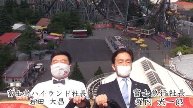 Fuji-Highland theme park executives showing how to ride a roller coaster without screaming