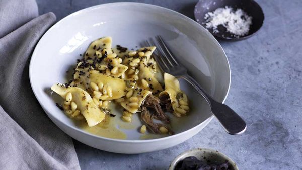 Mike Eggert's braised goat mezzaluna with goat milk brodo, pinenuts and black olive for BeefandLamb.com.au