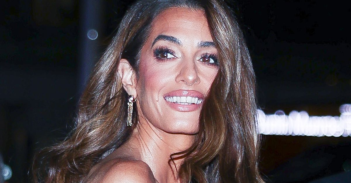 Amal Clooney steals the show in a flirty mini dress during date night with husband George at New York Film Festival