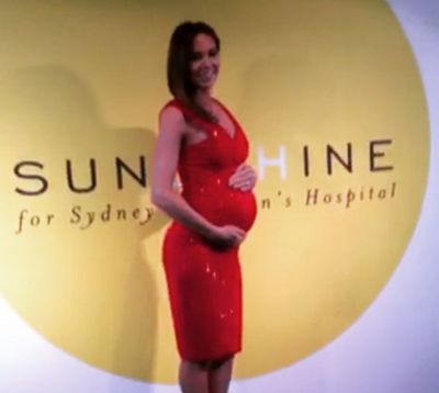 Michael Clarke's wife, Kyly, shows off her baby bump.