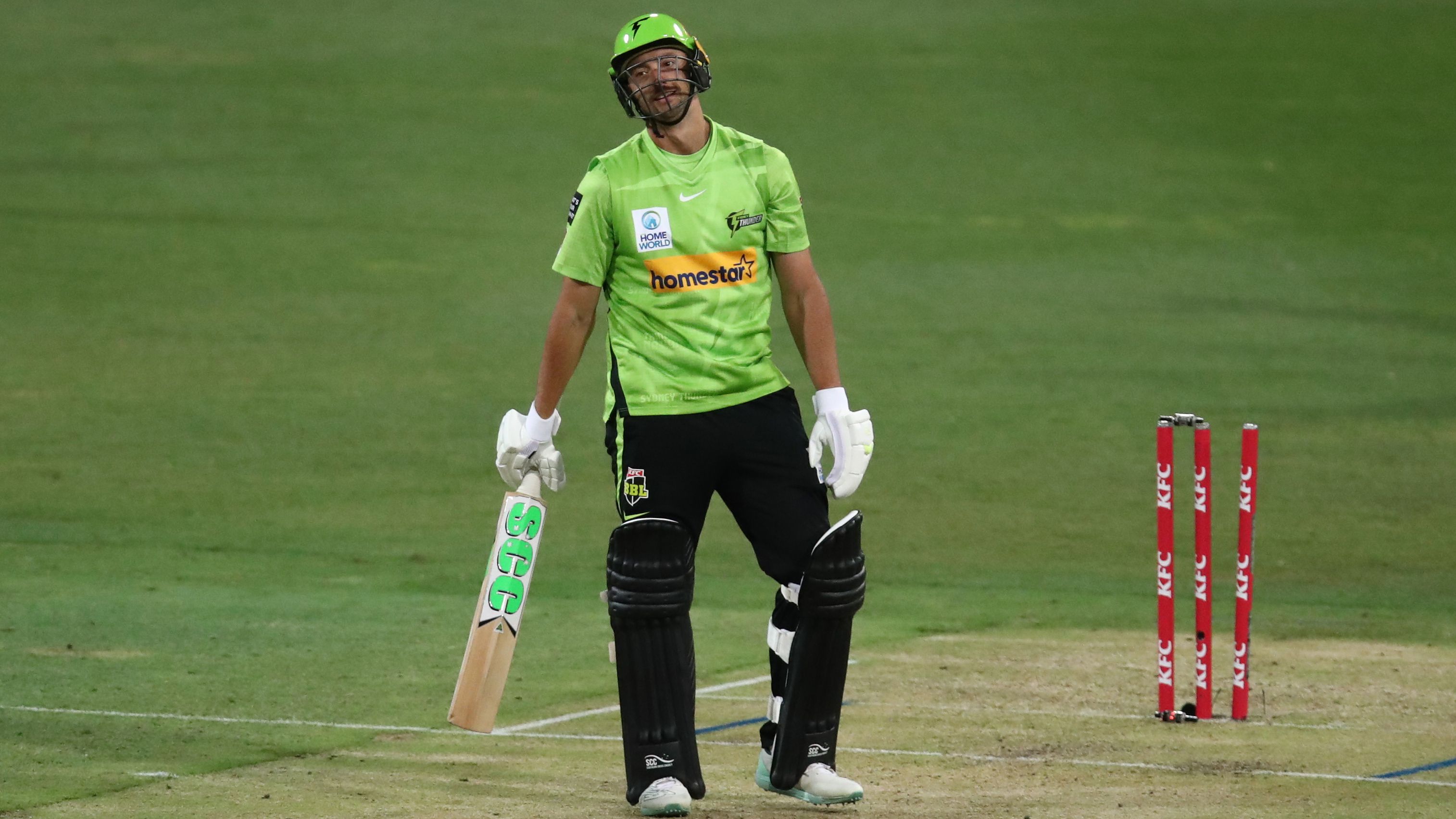 Daniel Sams of the Thunder walks off the field after been dismissed by Wes Agar of the Strikers during the Men&#x27;s Big Bash League match between the Sydney Thunder and the Adelaide Strikers at Sydney Showground Stadium on December 16, 2022 in Sydney, Australia. (Photo by Jason McCawley - CA/Cricket Australia via Getty Images)