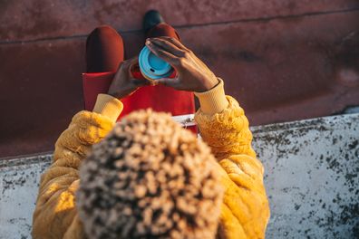 Woman enjoying a cup of coffee