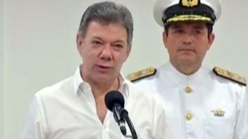 Columbian President Juan Manuel Santos (left).