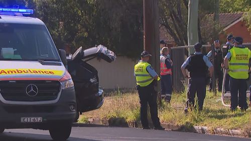 The trapped police officer has been freed from the vehicle. 