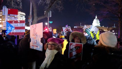 Protesters in Washington DC rallied to impugn the President. (AAP)