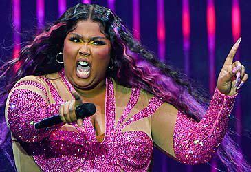 How long did it take Lizzo to change the phrase "I'm a spaz" to "hold me back" after releasing 'Grrrls'?