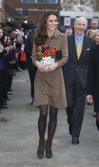Duchess of Cambridge wears Orla Kiely coat.