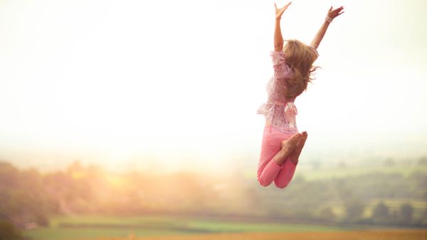 Woman jumping in the air