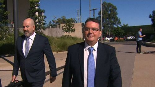 Logan Mayor Luke Smith (right) has vowed to fight corruption and perjury charges. (9NEWS)