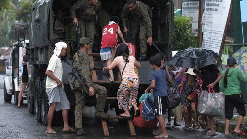 More than 200,000 people have been evacuated from coastal villages in the Philippines