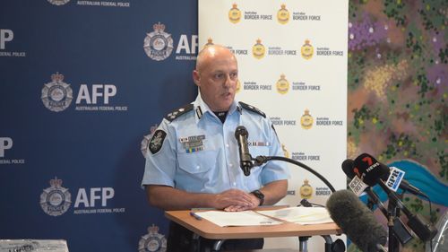 AFP acting Commander Graeme Marshall urged the three men to contact police.