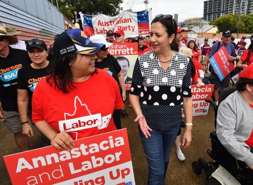 Annastacia Palaszczuk (right) is seen during the annual Labour Day march in Brisbane today. (AAP)