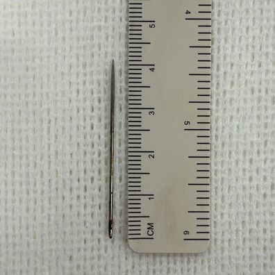 The sewing needle removed from Yoshi's chest measures 4cm