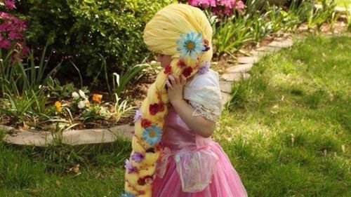 The Rapunzel wig as modelled by a young cancer patient. (GoFundMe)