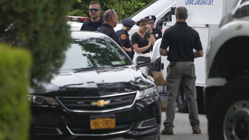 Authorities continue to work at the home of suspect Rex Heuermann in Massapequa Park, N.Y. 