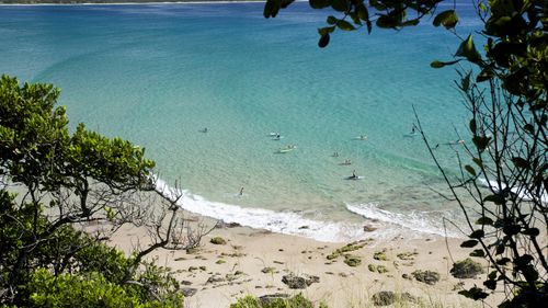 The man died after swimming north of Byron Bay, NSW.