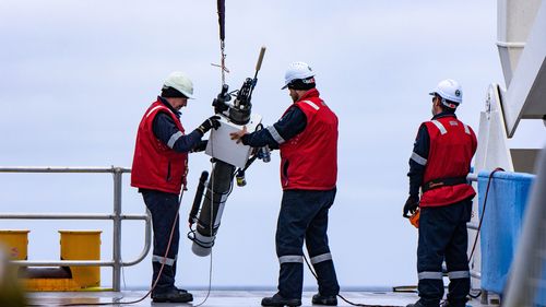 An Argo float in the process of being launched from the RV Investigator.