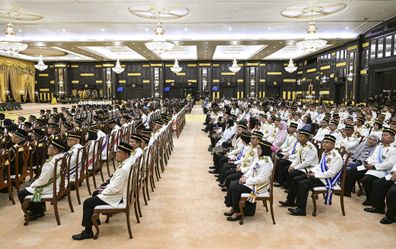 Officials sit during the oath taking ceremony of the 17th King of Malaysia at the National Palace in Kuala Lumpur, Malaysia, Wednesday, Jan. 31, 2024. 