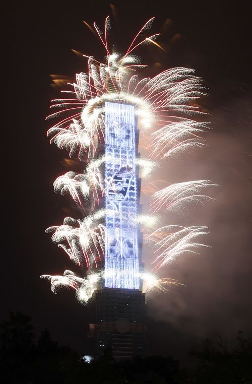 Fireworks explode from the Taipei 101 building during the New Year's celebrations in Taipei, Taiwan. (AAP)