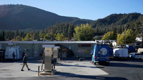 Media gather outside the Midway Market & Liquor store where a winning lottery ticket was sold in Frazier Park, California.